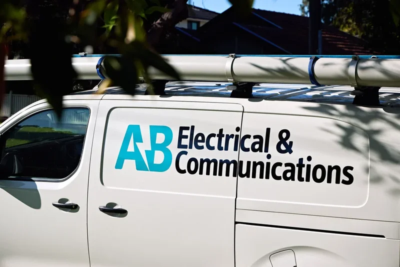 AB Electrical communications van with signage