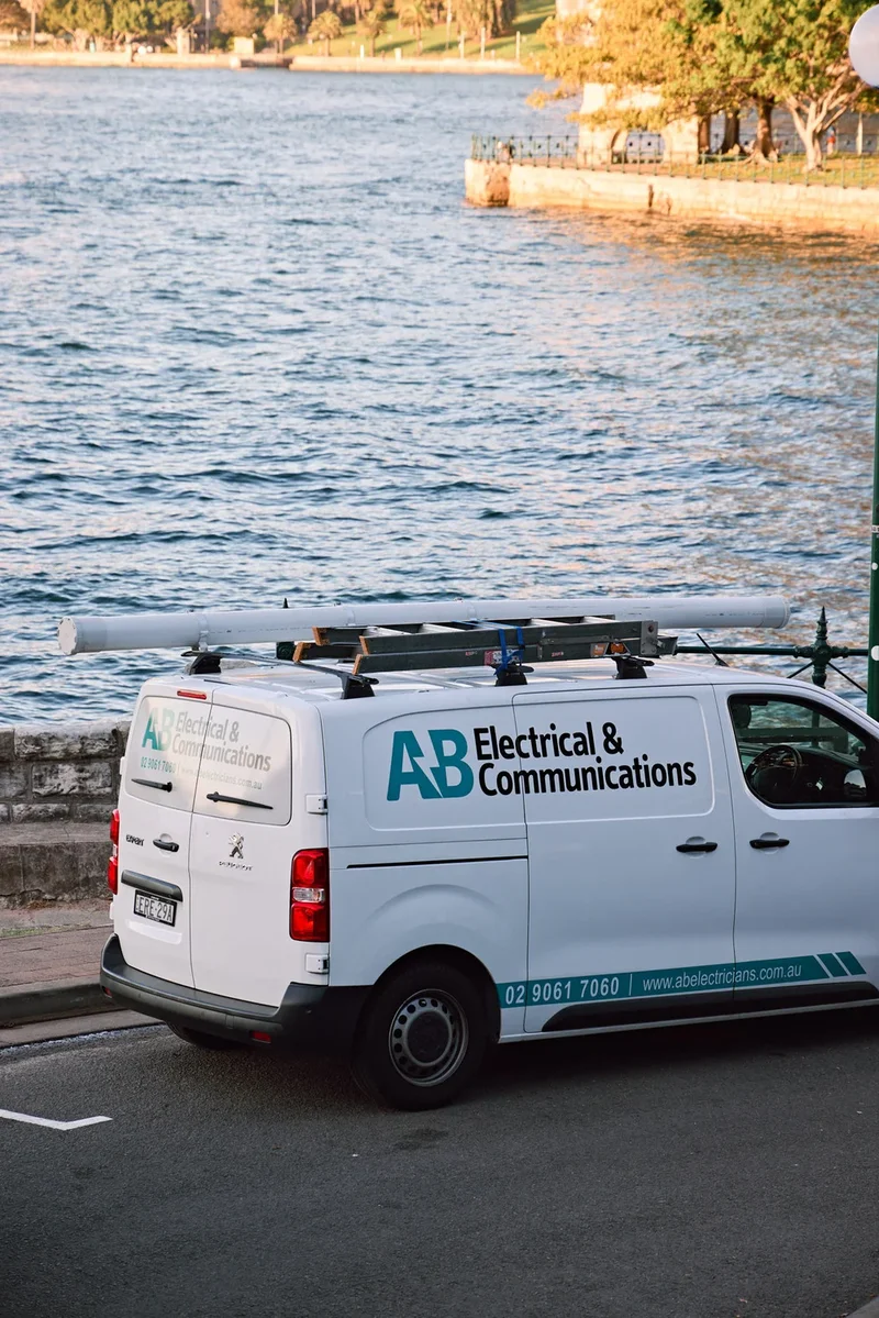 AB Electrical van by the water in Sydney